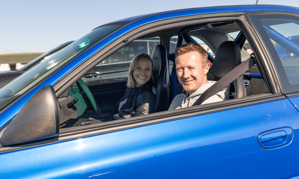 Vicki Butler-Henderson and Gordon Shedden sat in a stationary Prodrive P25